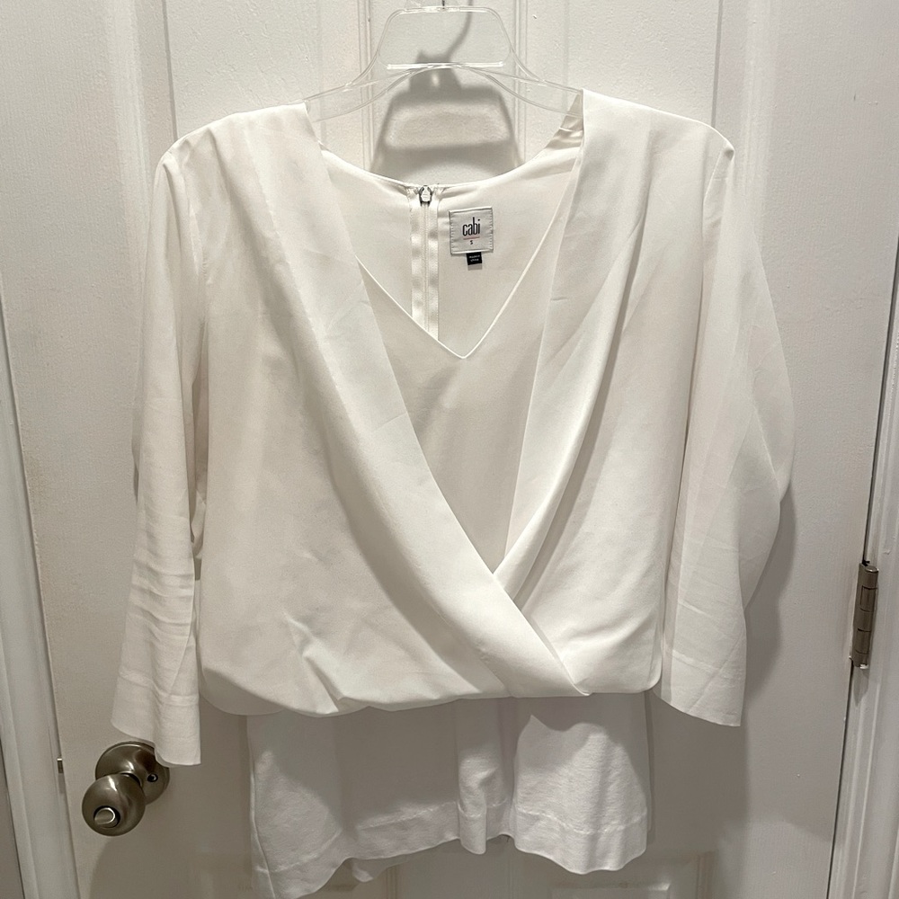 CAbi  Style # 5339 Small white Indulge, pullover blouse. Zips in back. EUC.